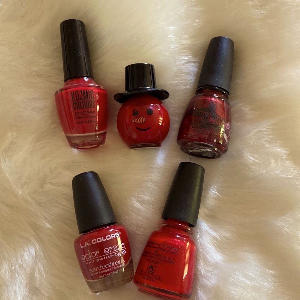 Set of five red nail polishes